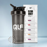 Probierbox Clear Whey, 5 x 30g inkl. Gratis-Shaker mit proteinreichem Softdrink und Metallmischkugel in Schwarz