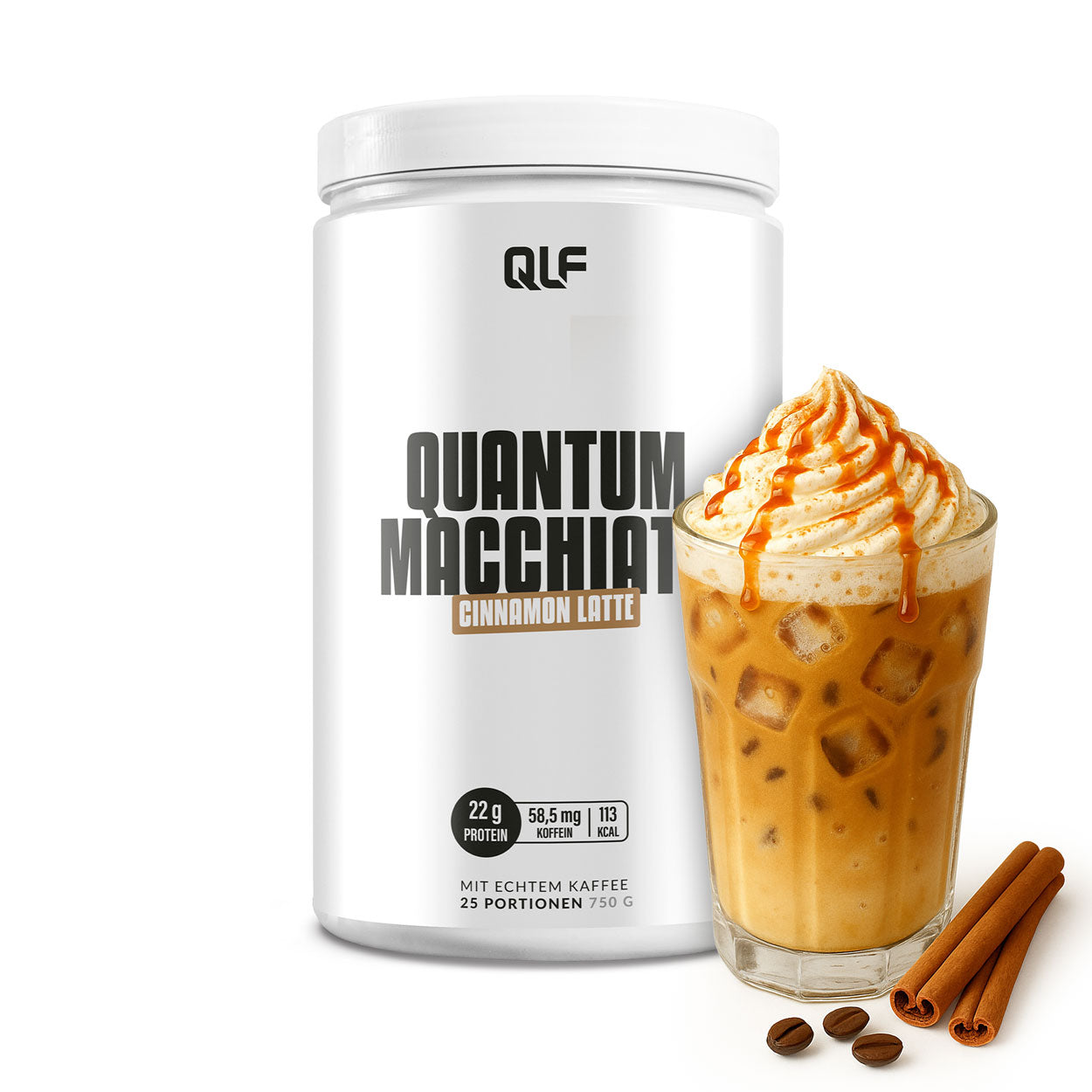 White container labeled Quantum Macchiato Cinnamon Latte next to iced coffee topped with whipped cream and caramel drizzle with cinnamon sticks and coffee beans nearby