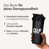 Eine Hand hält einen schwarzen Shaker vor beigem Hintergrund. Links stehen Werbeaussagen: "Das Beste für deine Darm-Gesundheit", "Wissenschaftlicher Komplex", "Premium-Qualität", "Optimale Nährstoff-Absorption".